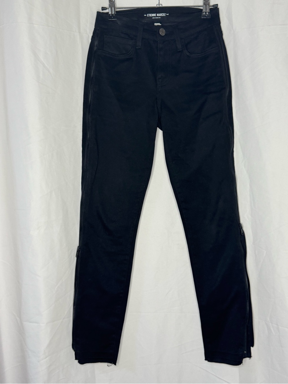 Black Denim Jeans with Branded Metal Button and zipper up the side leans